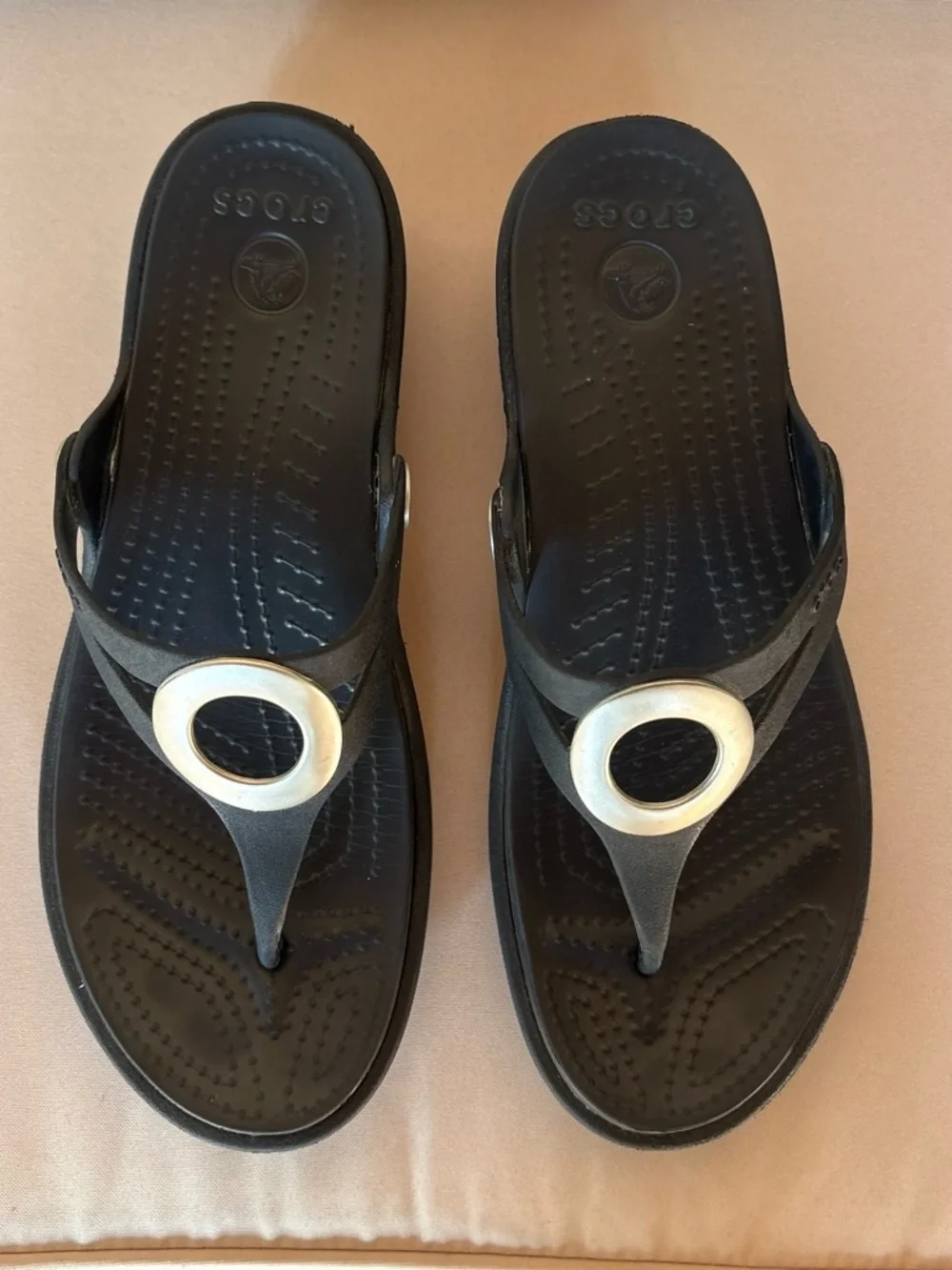 CROCS Womens Black Thong Sandals with Silver Oval Accent